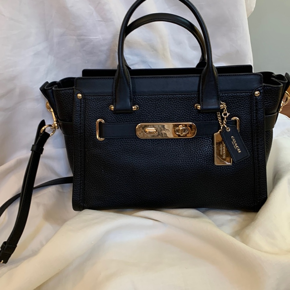 Coach Pebble black shoulder bag with gold accents